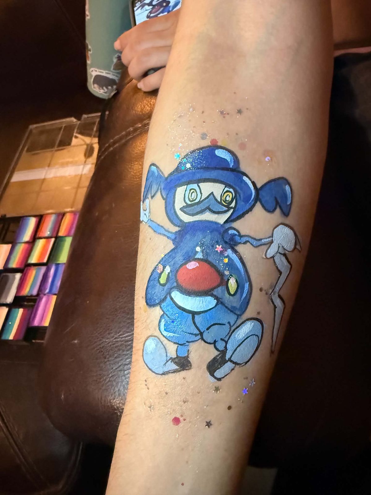 Character arm painting at a Tucson event
